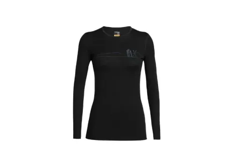 Icebreaker WOMEN'S MERINO 200 OASIS LONG SLEEVE CREWE SKIS IN SNOW